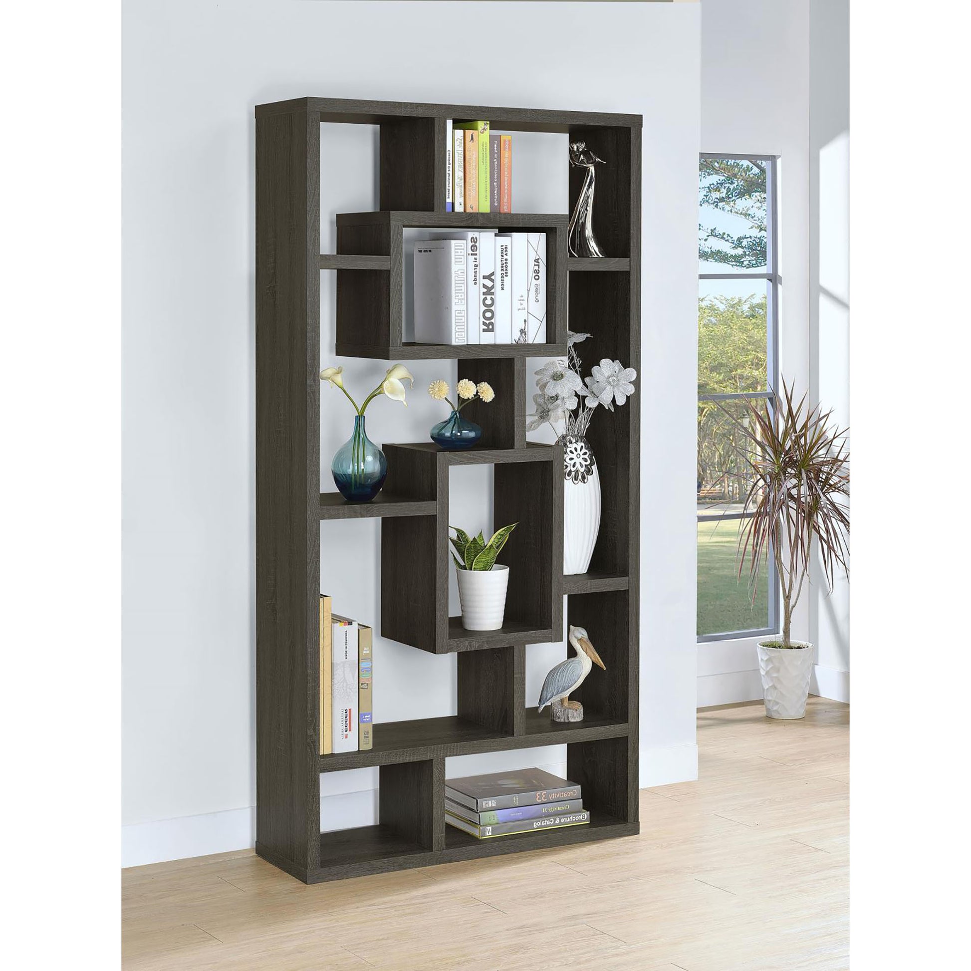 Dark oak modern bookshelf with staggered shelves for display