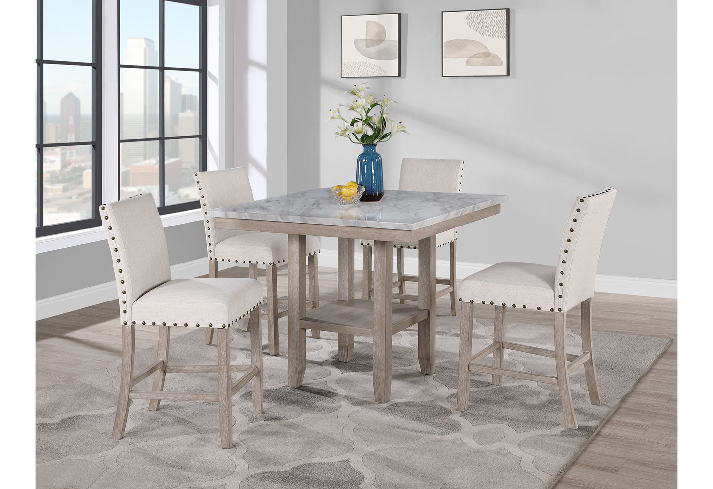 Square marble top bar table with distressed wood base and four upholstered stools