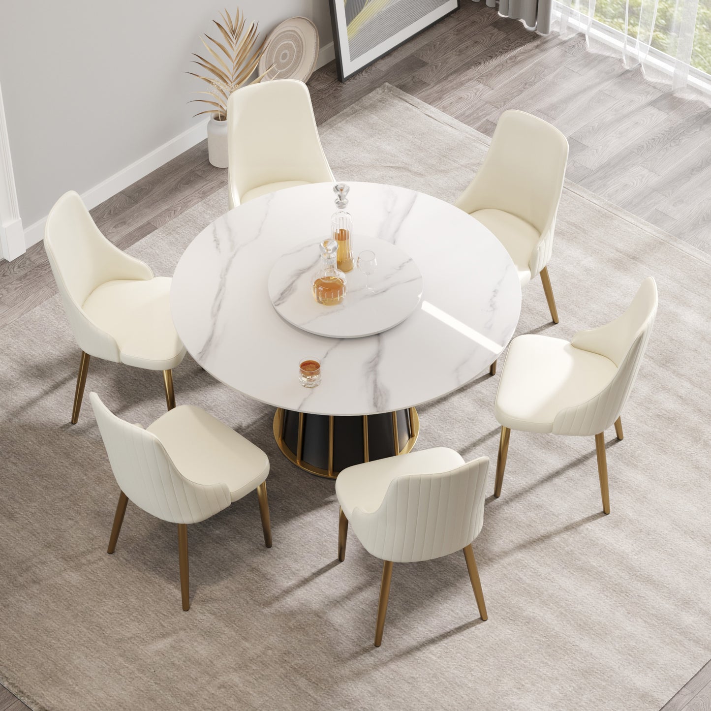 White marble dining table with gold base and six cream chairs