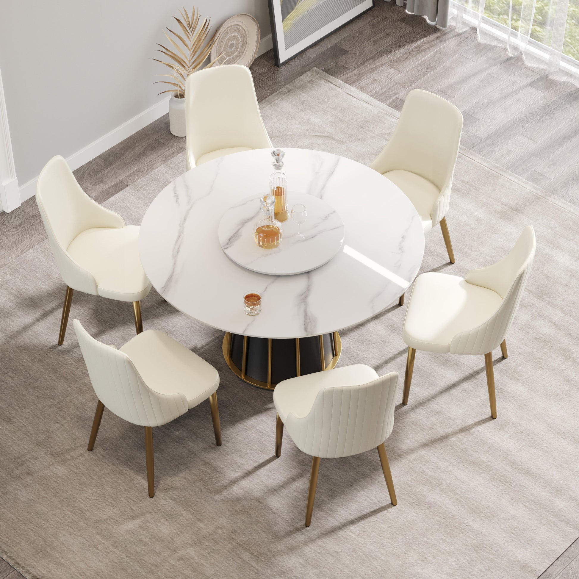 White marble dining table with gold base and six cream chairs