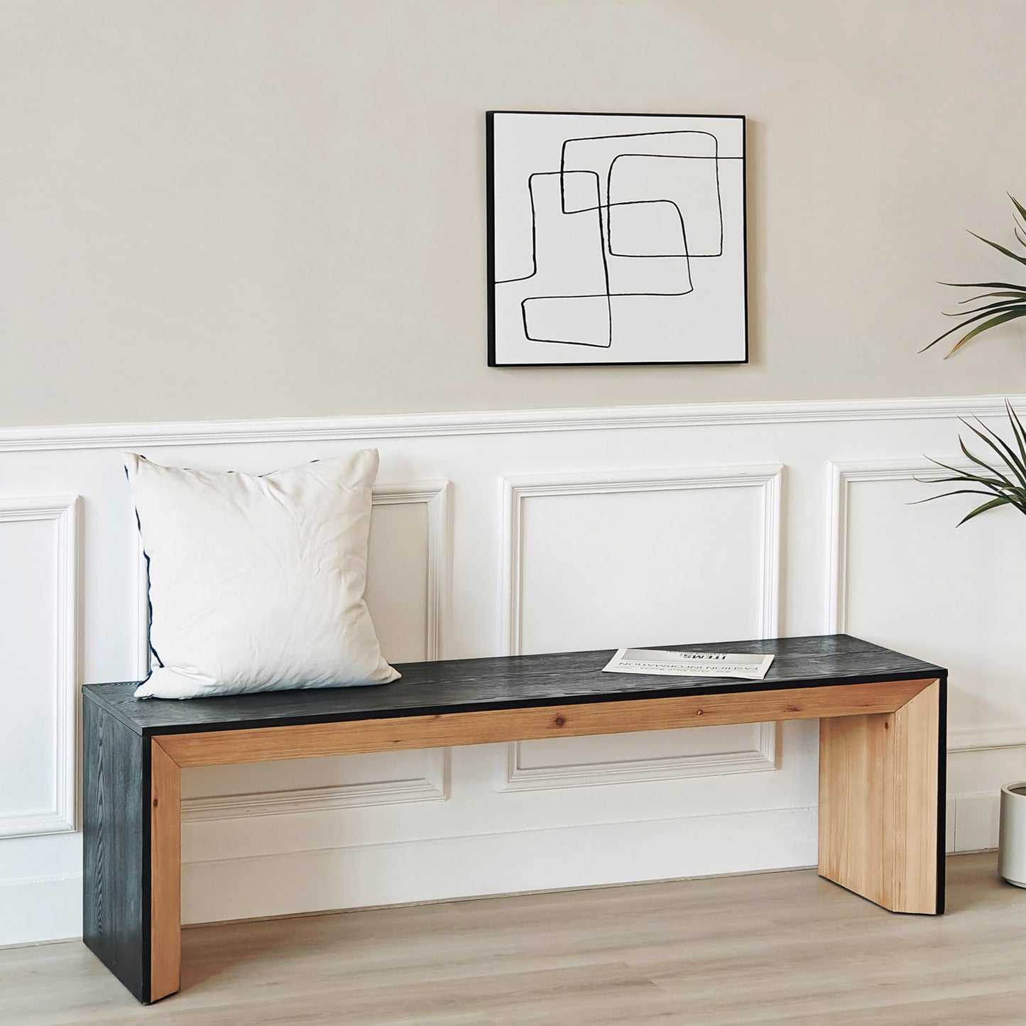Modern black and natural wood entryway bench with white cushion