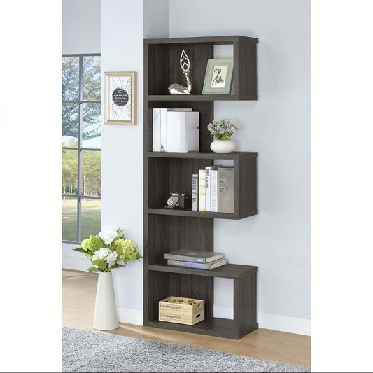Modern grey zigzag corner bookshelf with decorative items