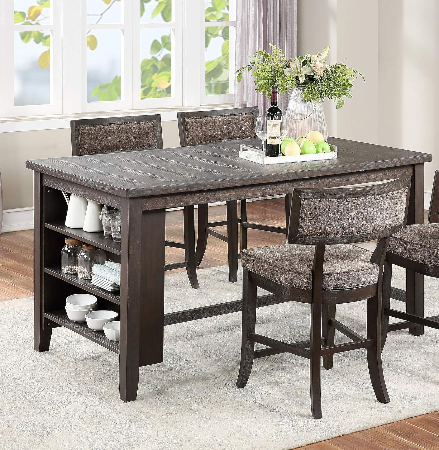 Dark wood counter height table with builtin shelving