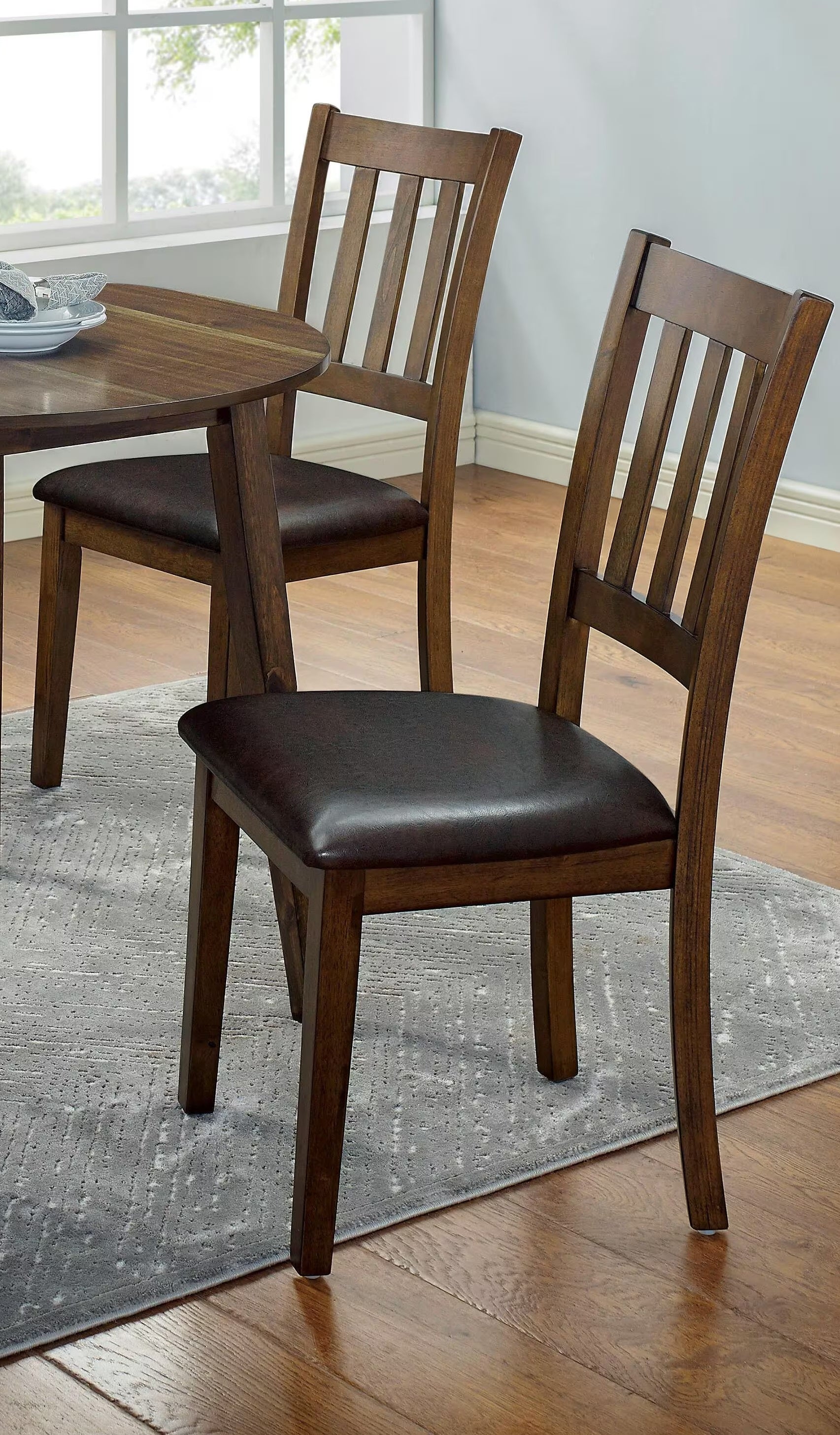 Dark wood dining chair with upholstered seat
