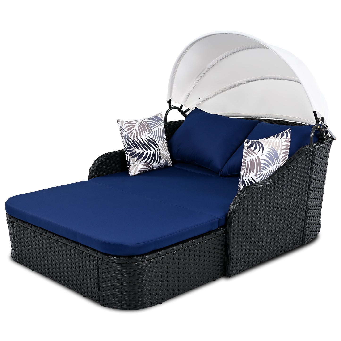 Wicker daybed with retractable canopy and navy cushions