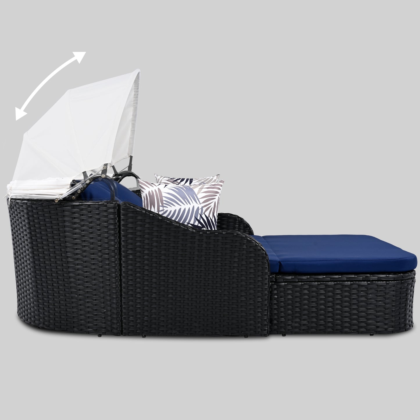 Black wicker patio daybed with adjustable canopy and navy cushions