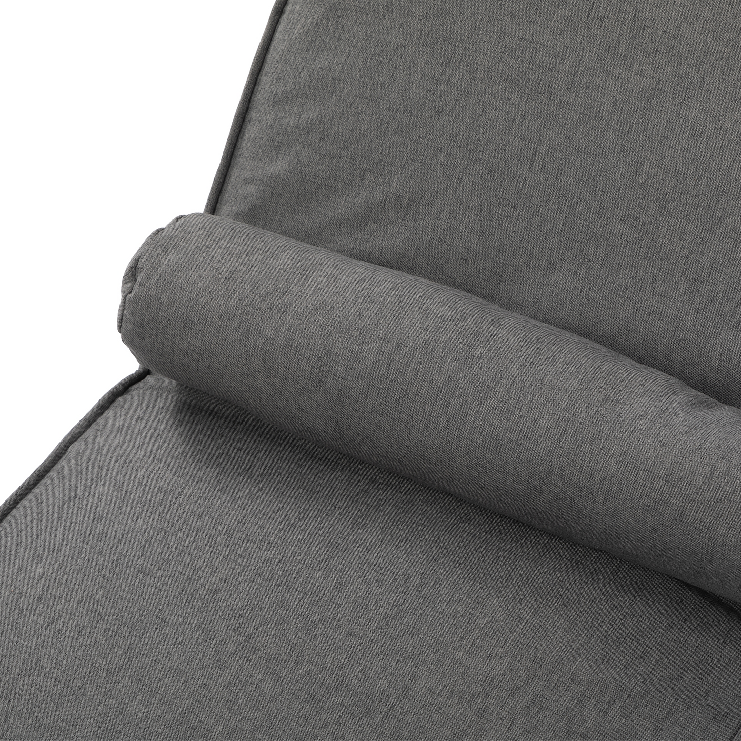 Closeup of textured charcoal gray fabric on a recliner with a bolster pillow