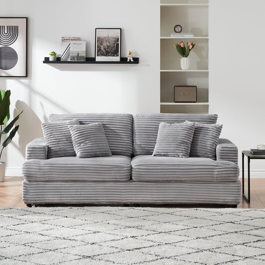 Cozy corduroy sofa in light gray perfect for modern living rooms
