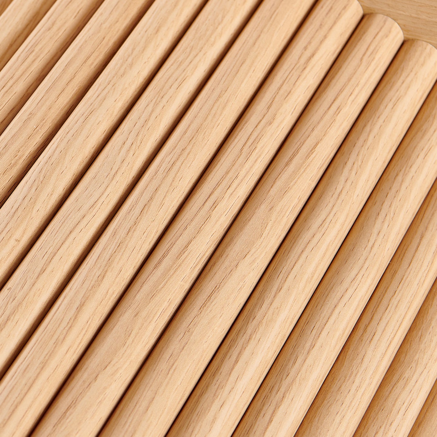 Natural oak wood dowels arranged diagonally