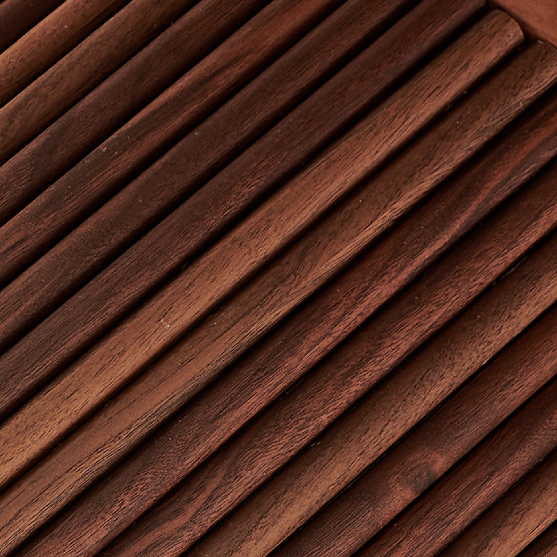 Closeup of dark brown wood slat texture
