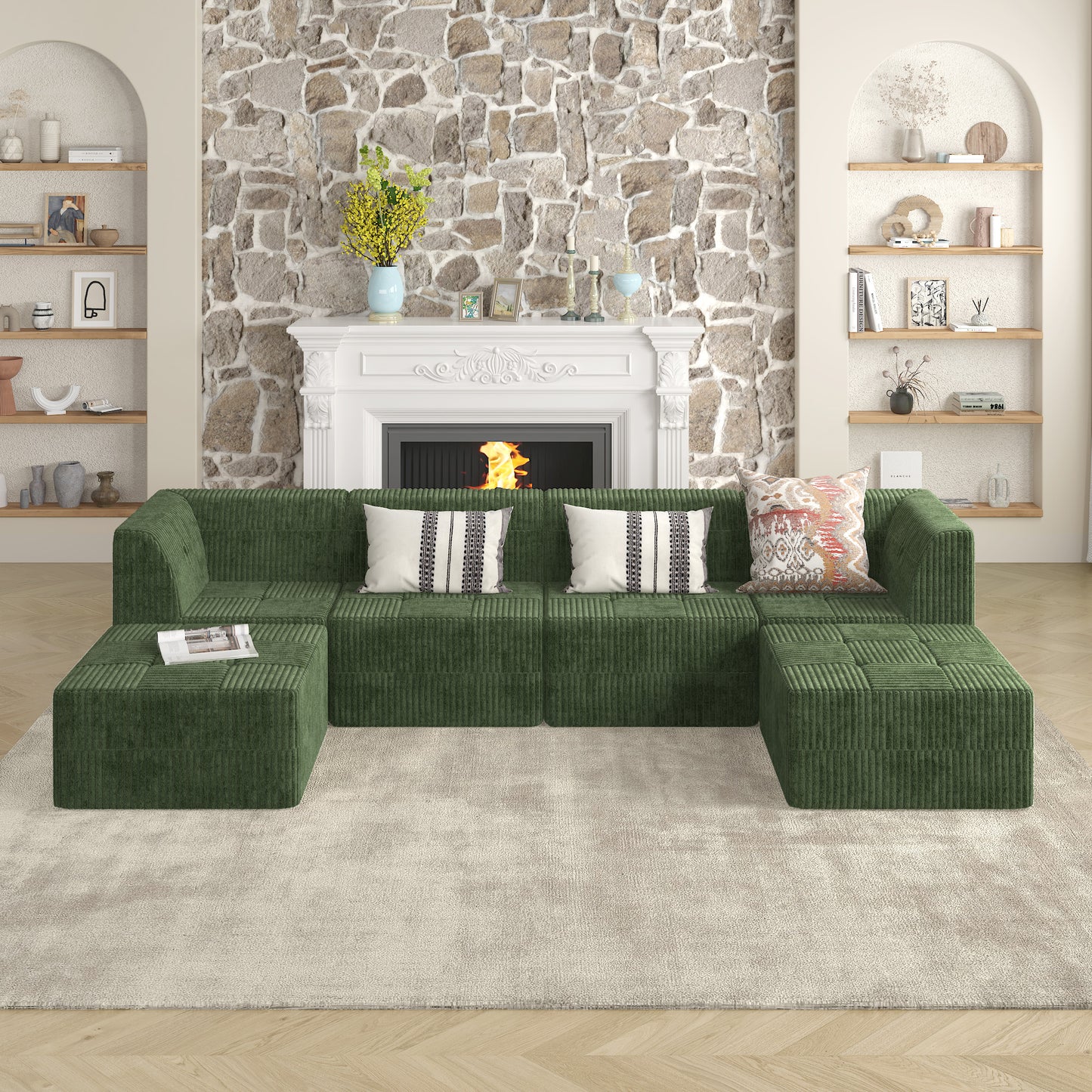 Green corduroy sectional sofa with matching ottomans and decorative pillows