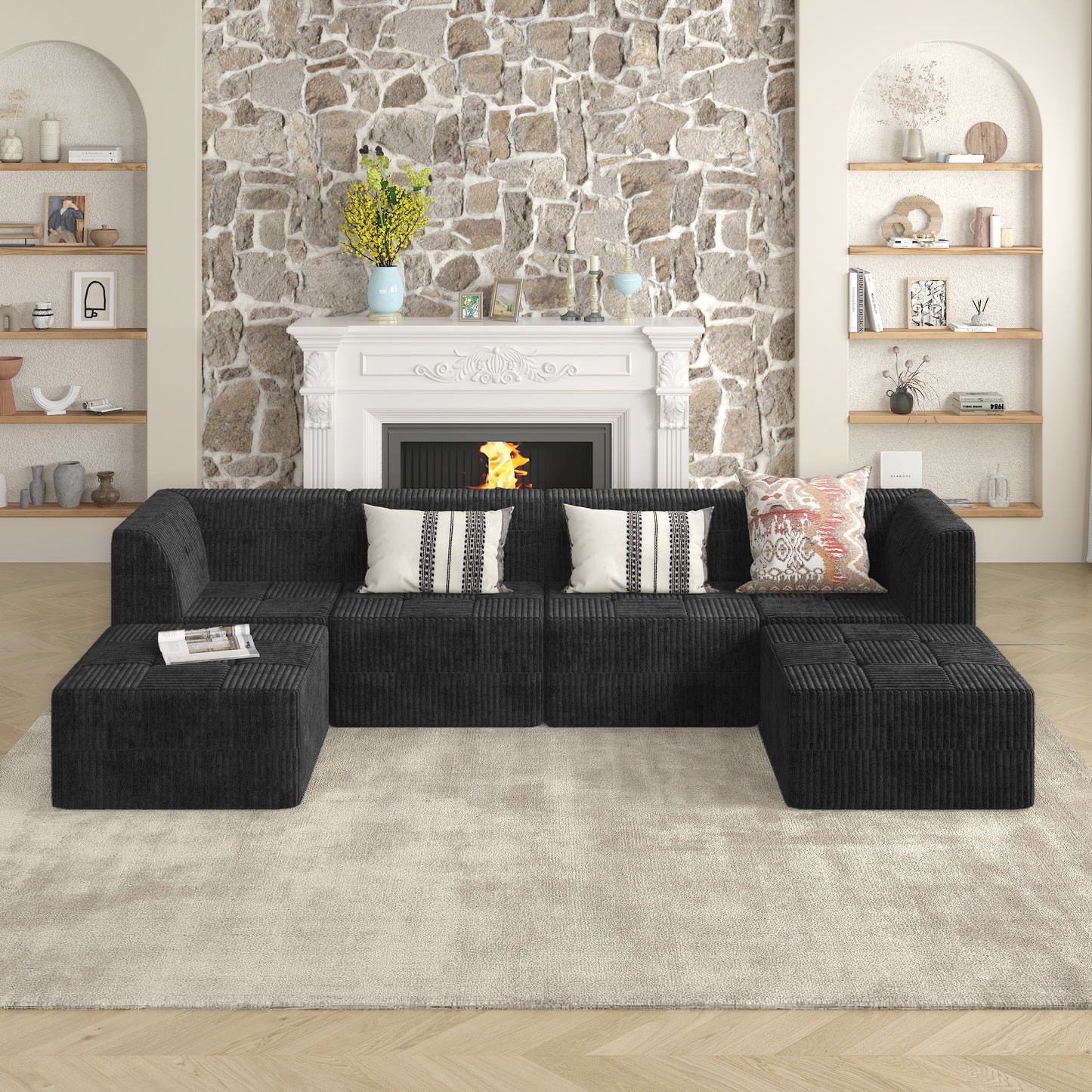 Black corduroy sectional sofa with modular ottomans