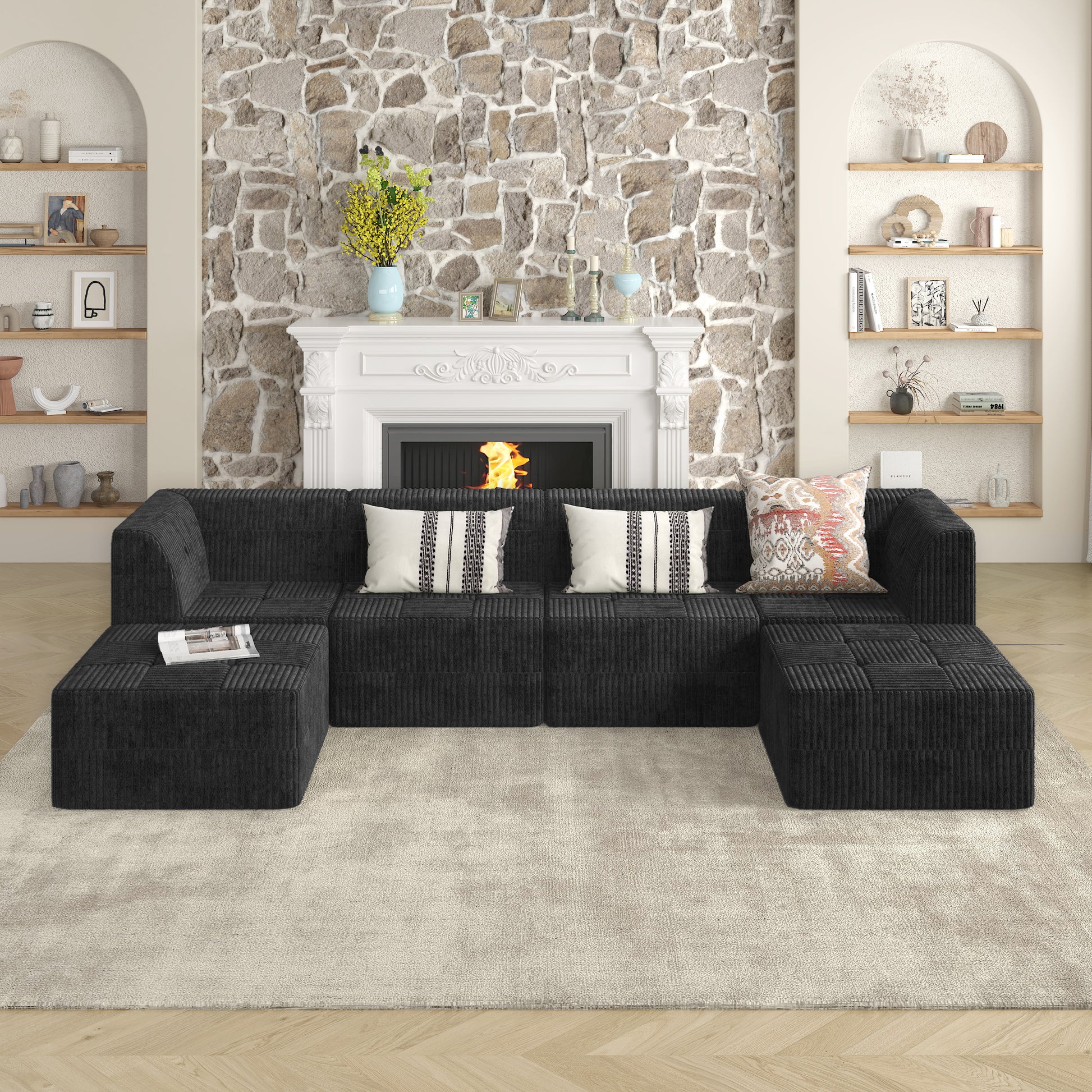 Black corduroy sectional sofa with modular ottomans