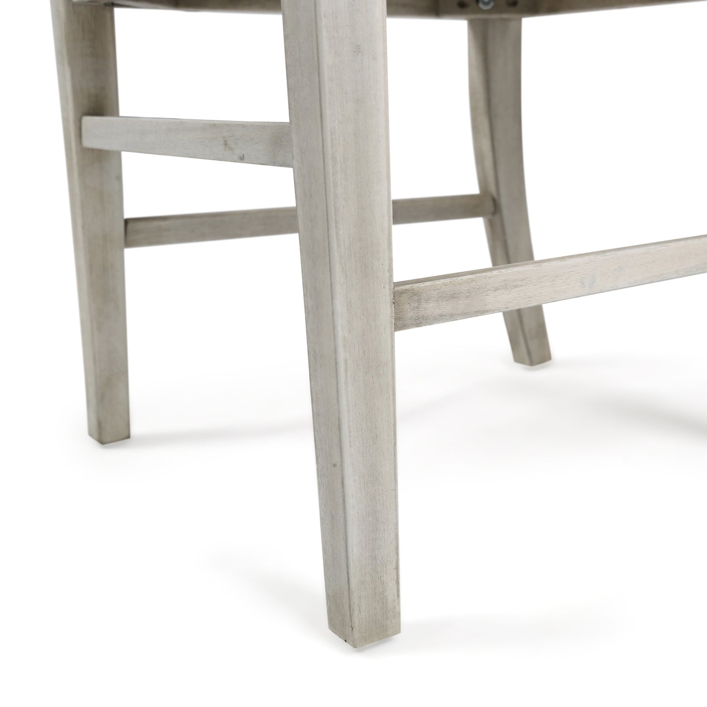 Closeup of weathered gray wood bar stool legs on white background