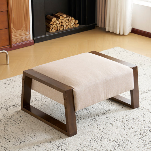 Beige fabric ottoman with dark wood frame
