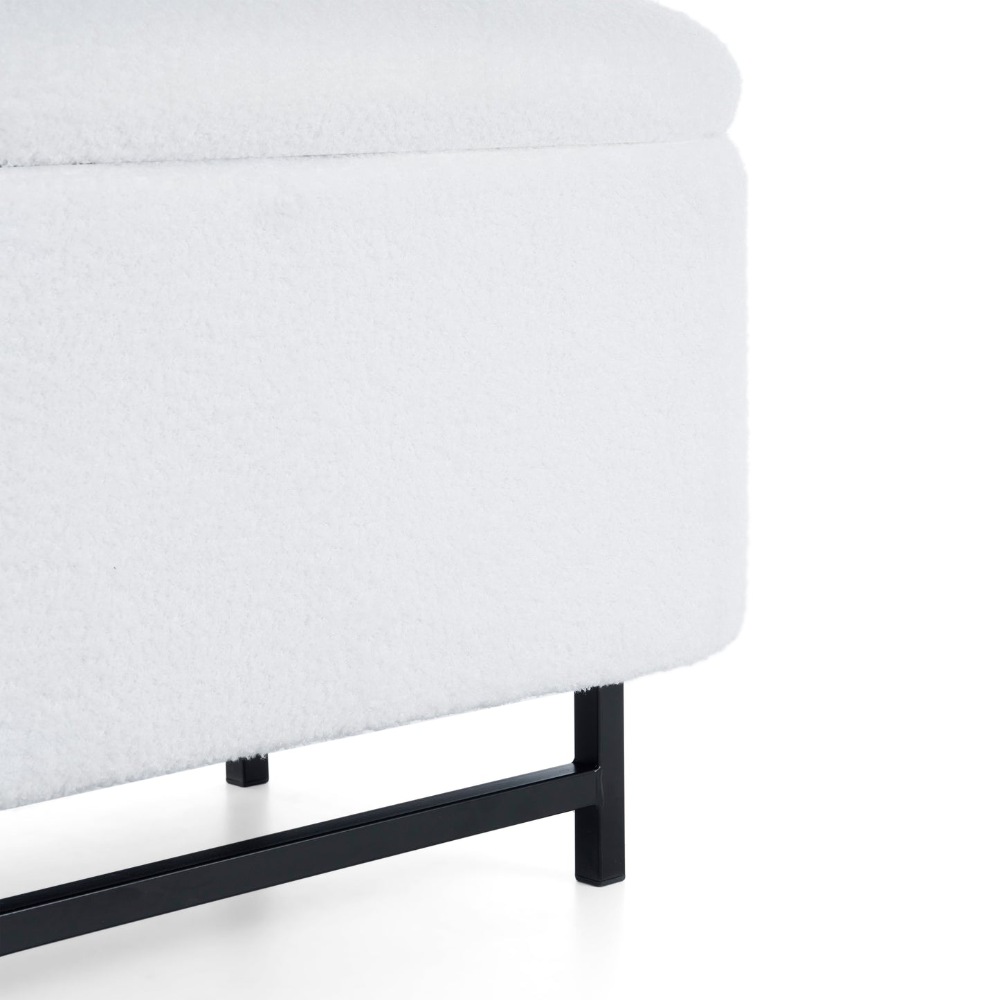 White boucle ottoman with black metal legs and hidden storage compartment