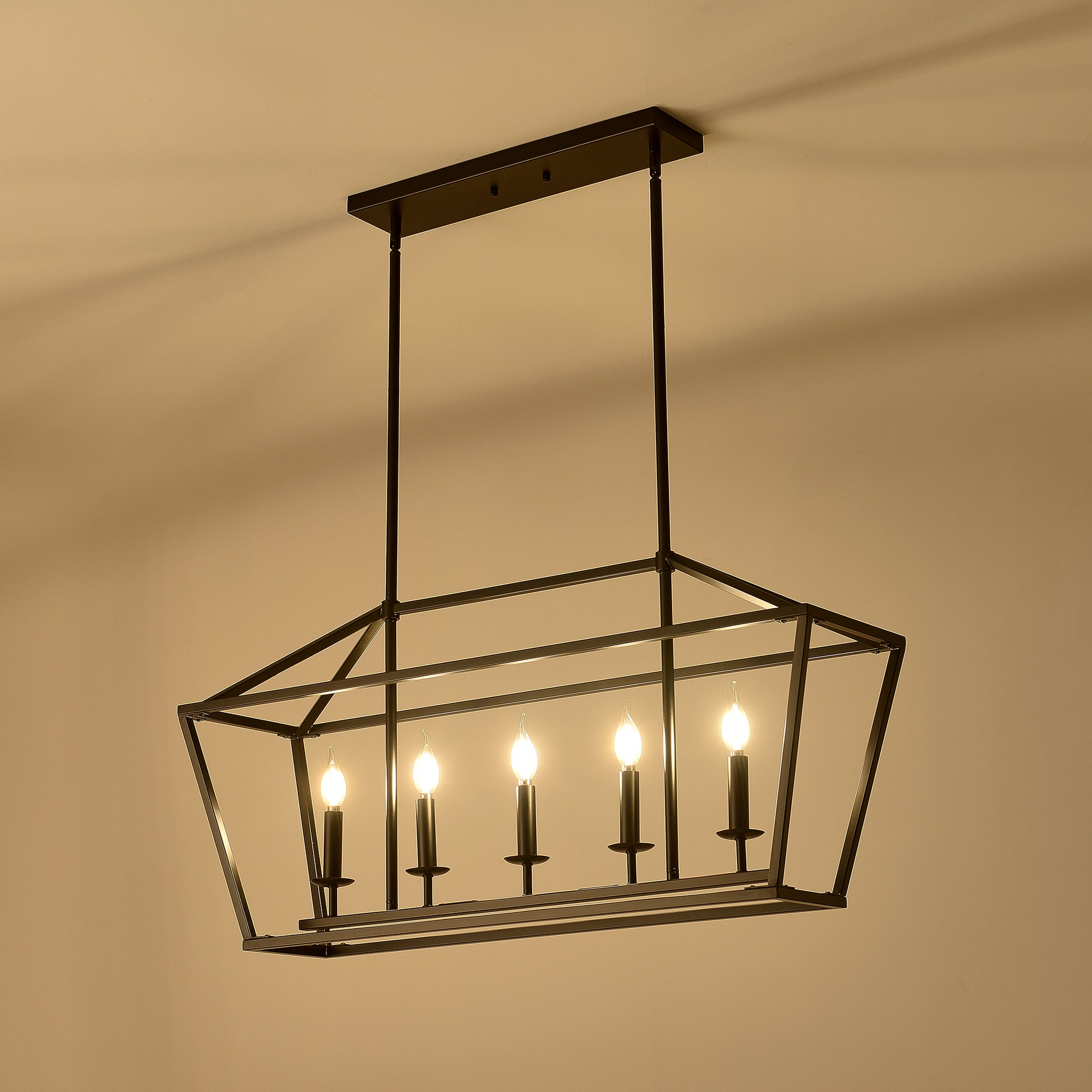 Black metal farmhouse chandelier with five candlestyle bulbs