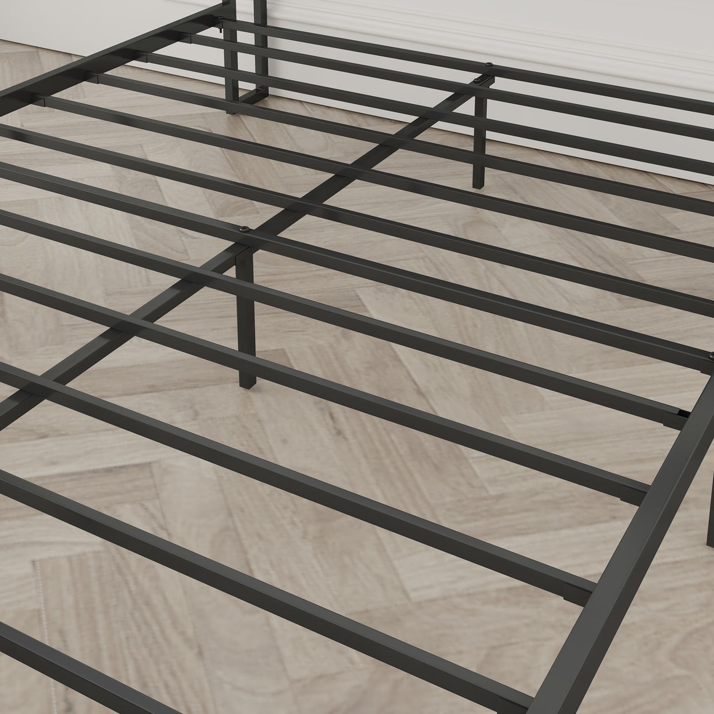 Closeup of a black metal bed frame with a slatted platform