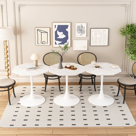 White marble octagonal tulip dining table with cane back chairs