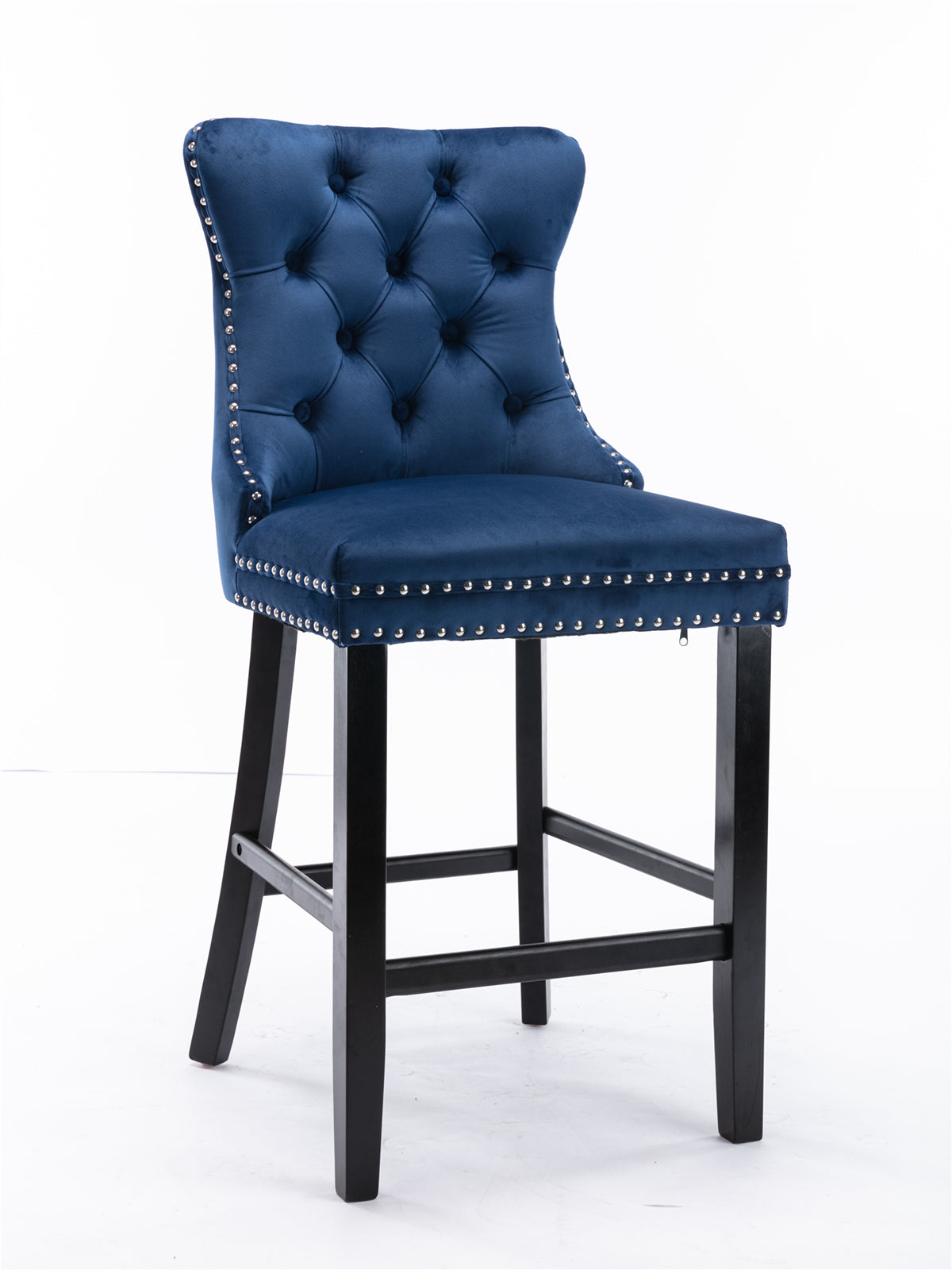 Tufted navy velvet bar stool with silver nailhead trim and dark wood legs