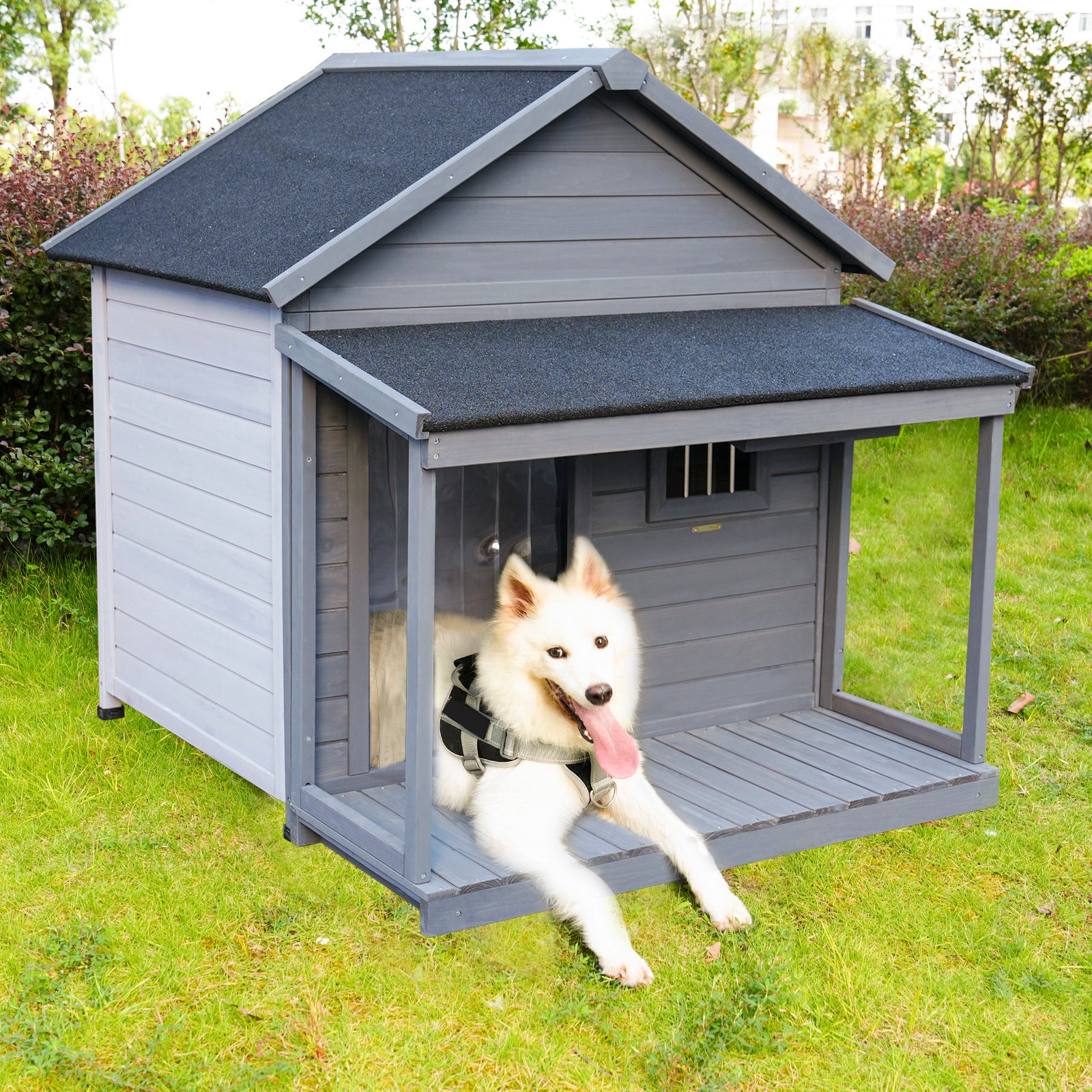 Gray wooden dog house with porch