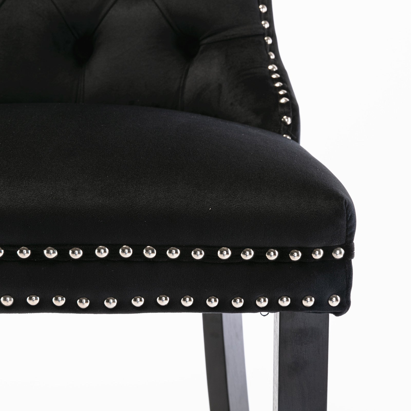 Black velvet accent chair with silver nailhead trim