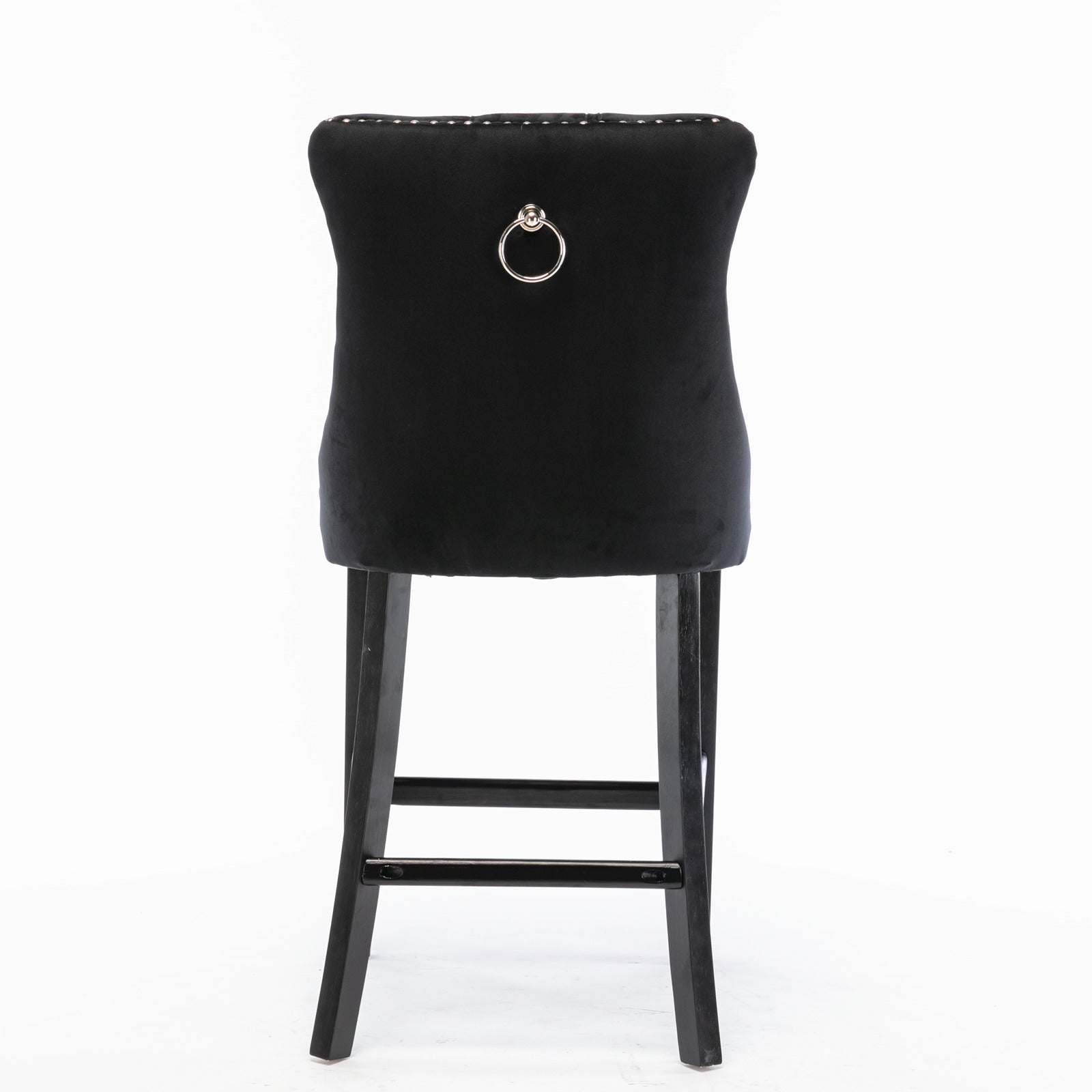 Black velvet bar stool with silver nailhead trim and a decorative ring accent