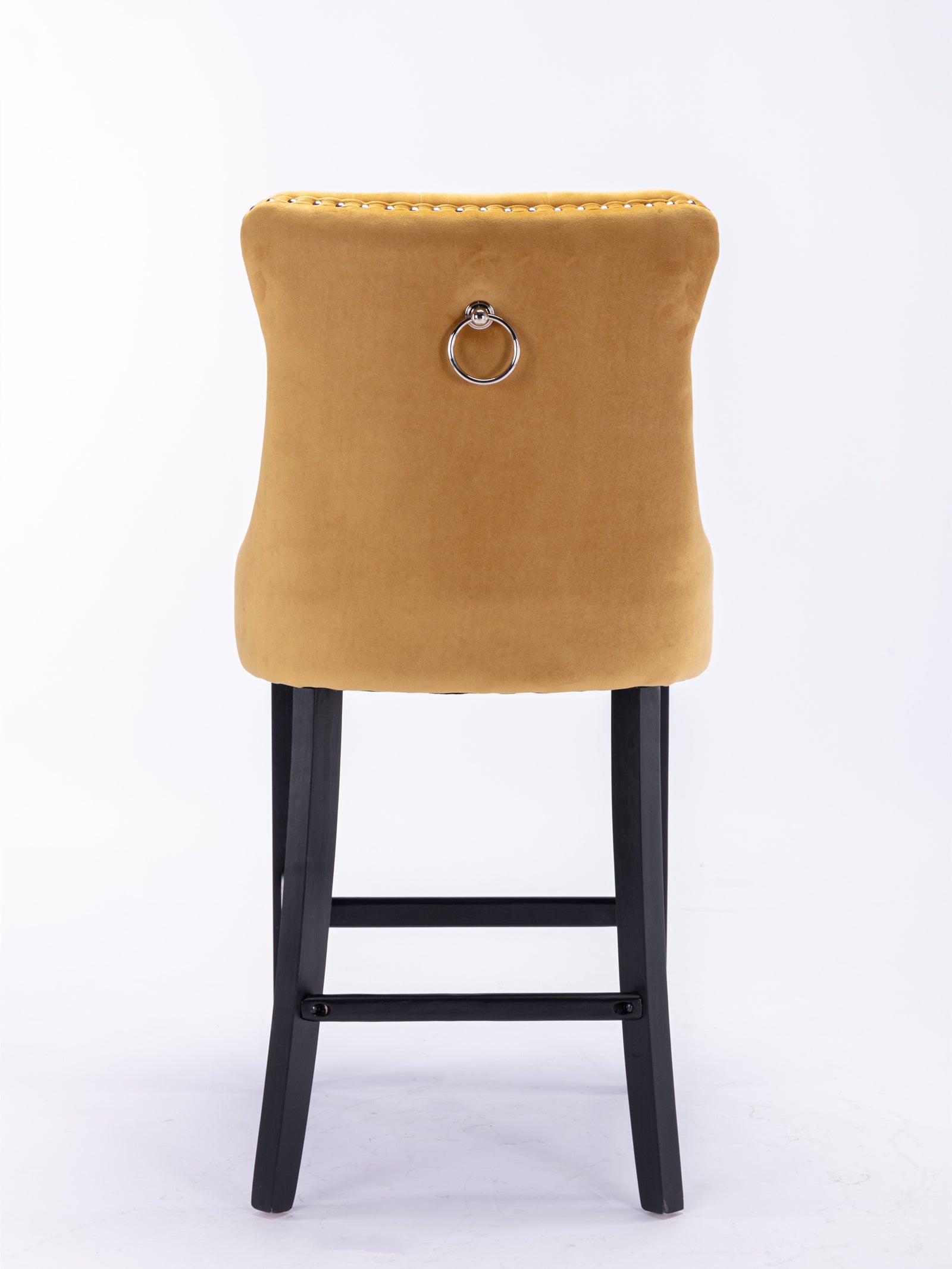 Yellow velvet bar stool with tufted back and silver ring pull