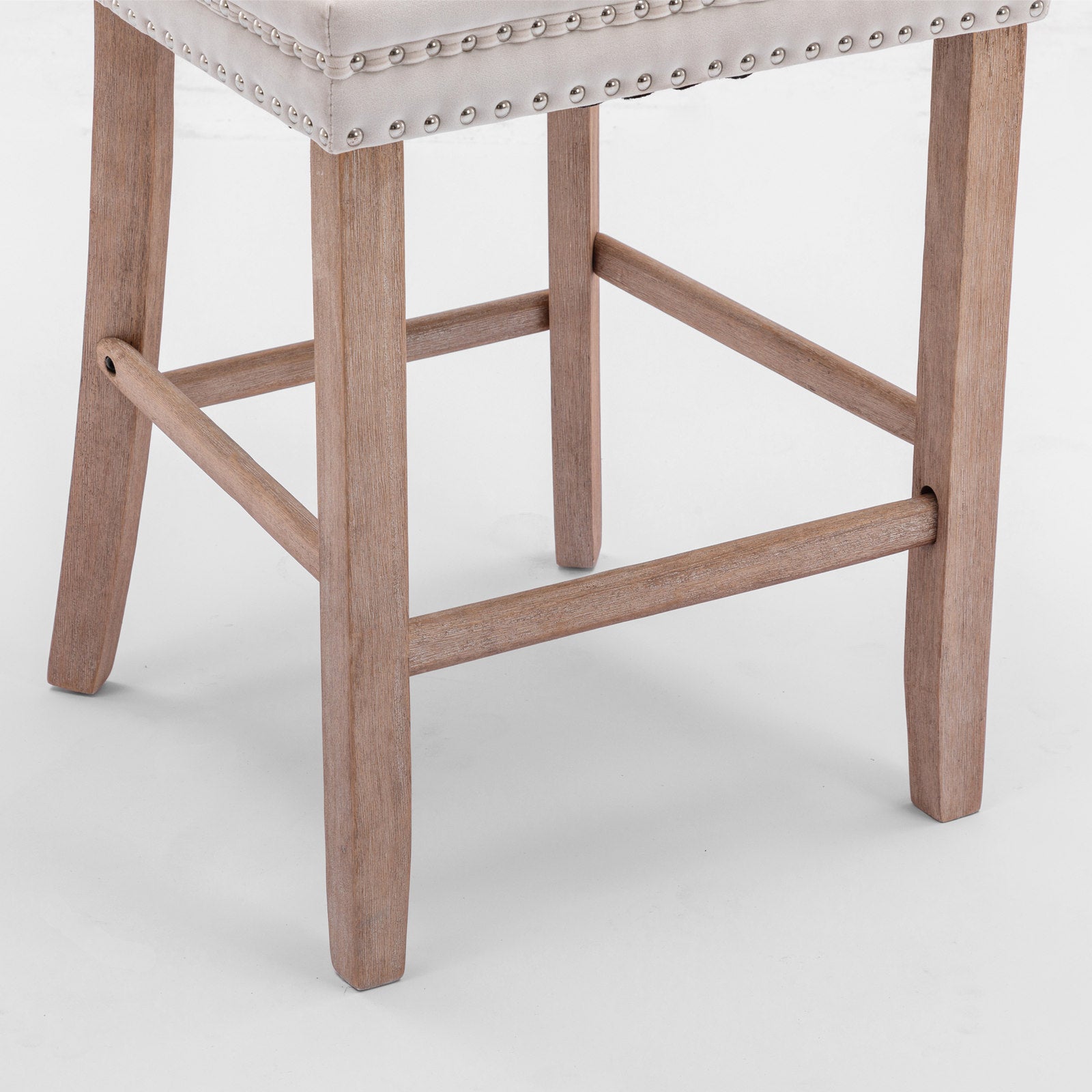 Rustic wood and upholstered counter stool with nailhead trim