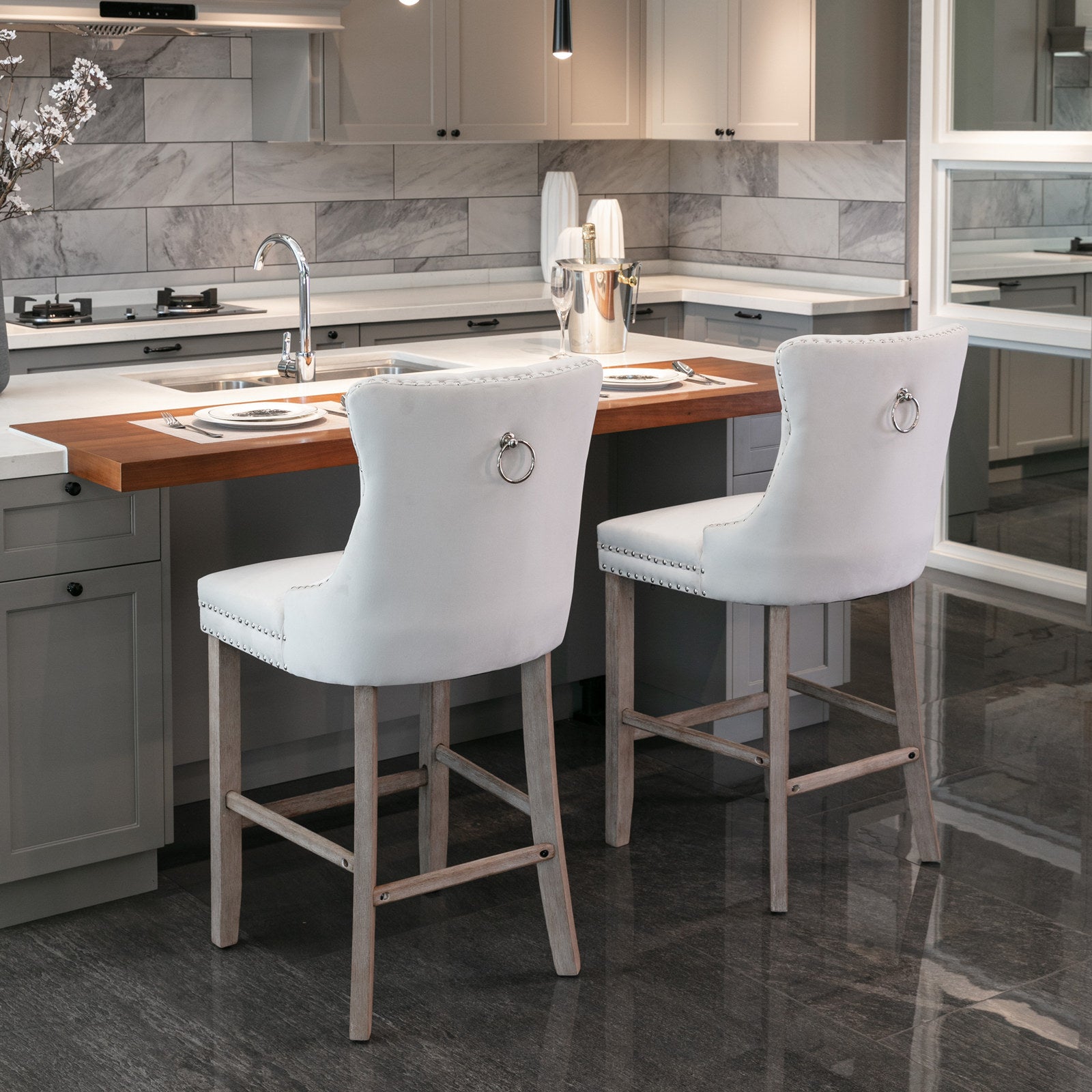 Elegant white velvet tufted bar stool with silver ring detail