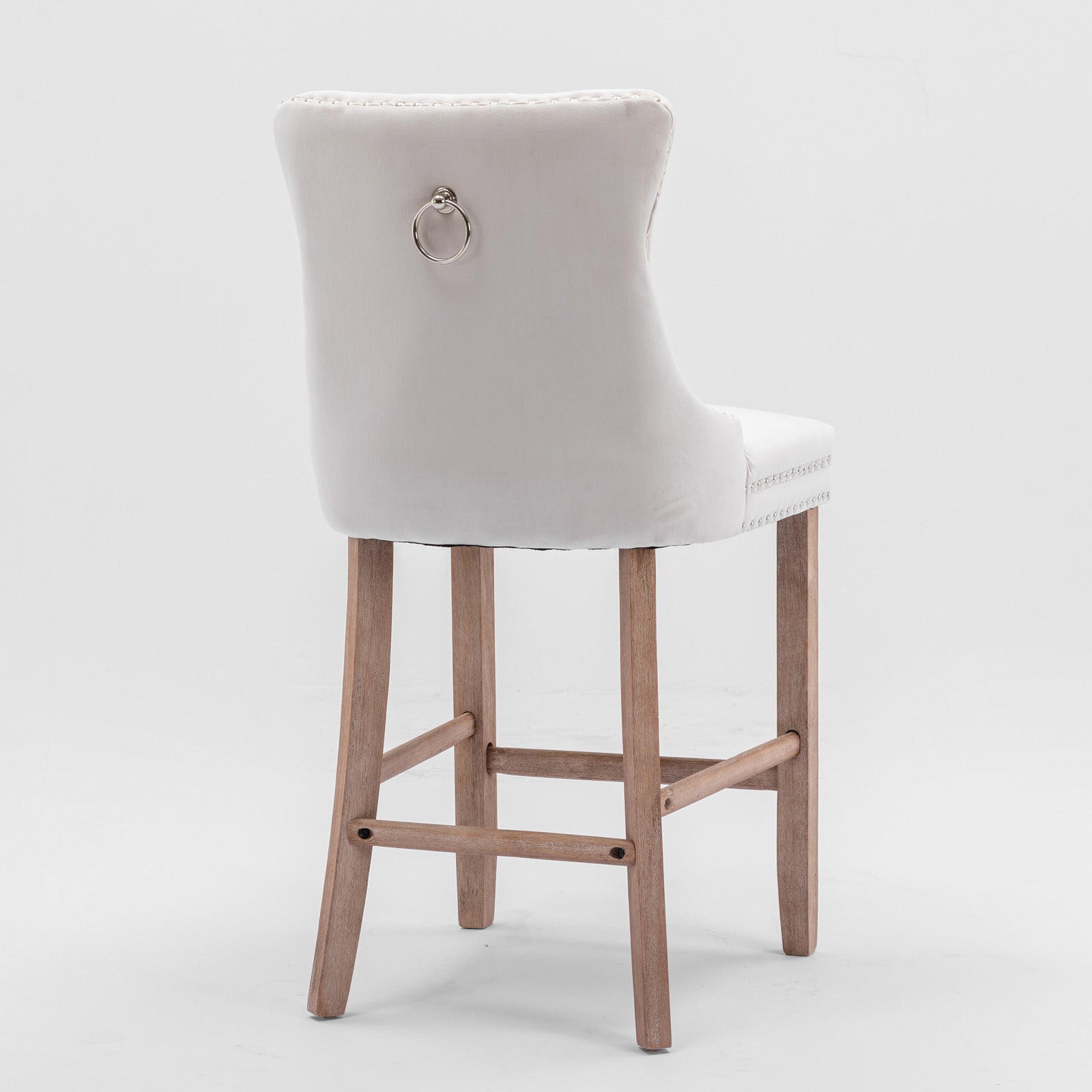 White velvet tufted bar stool with ring back and wooden legs
