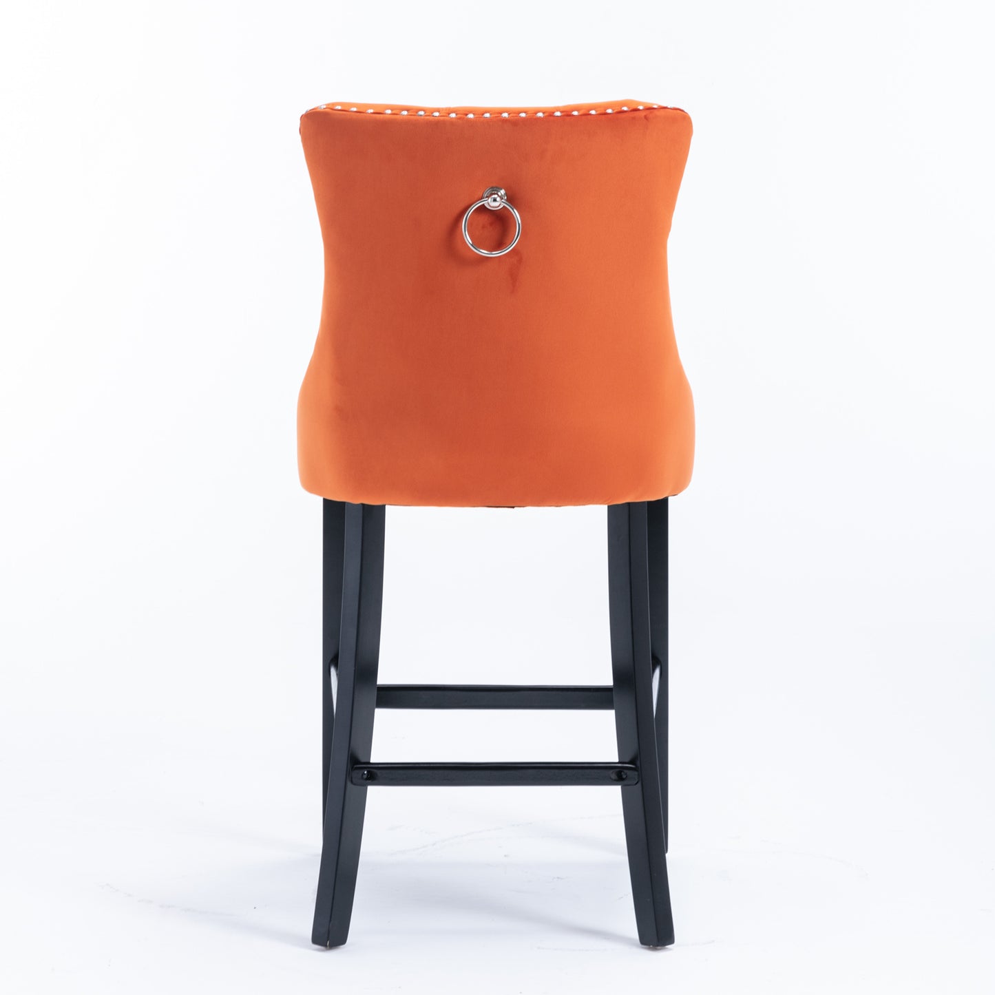 Orange velvet bar stool with silver ring pull detail on back