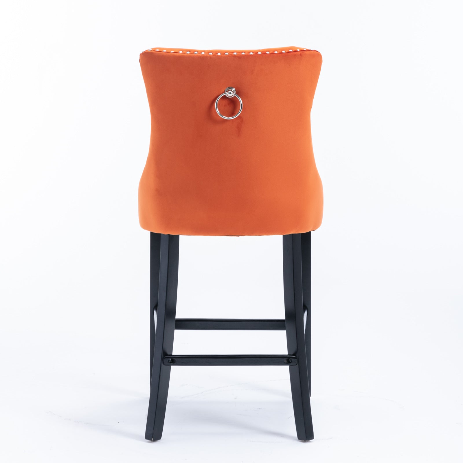 Orange velvet bar stool with silver ring pull detail on back