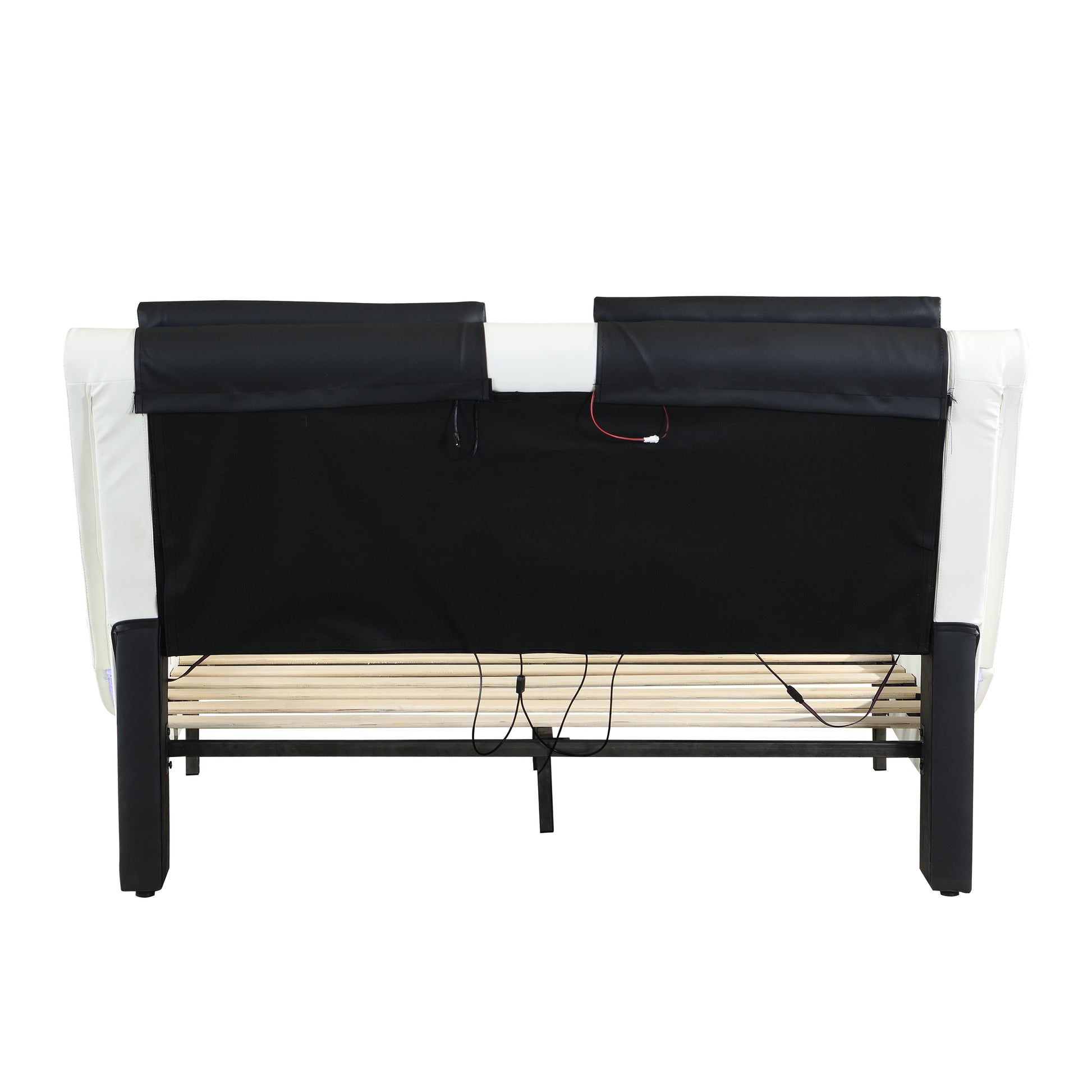 Rear view of a white and black leather platform bed frame showing wooden slats and wiring