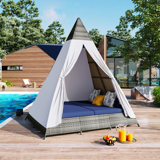 Pyramidshaped outdoor daybed with grey wicker frame and blue cushions