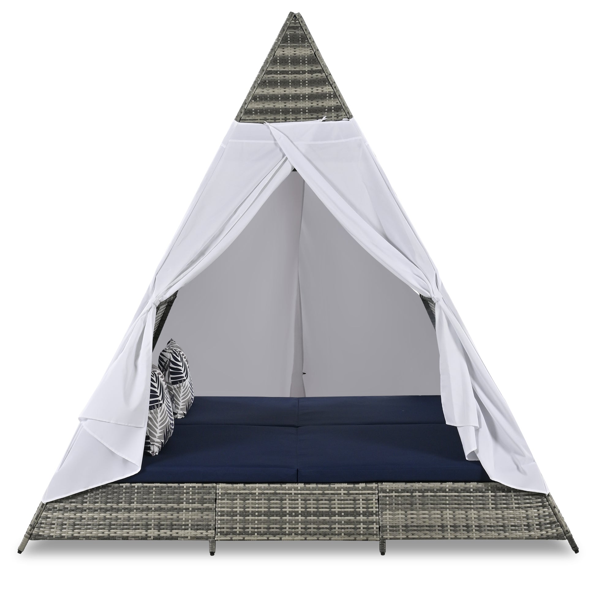 Grey wicker outdoor daybed with navy cushions and white canopy