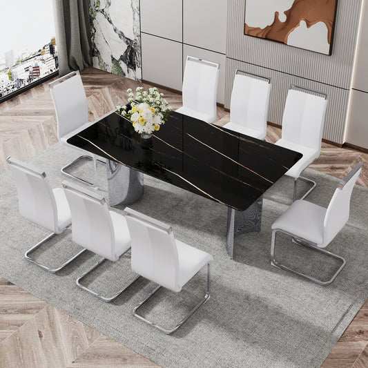 Black marble dining table with white leather chairs