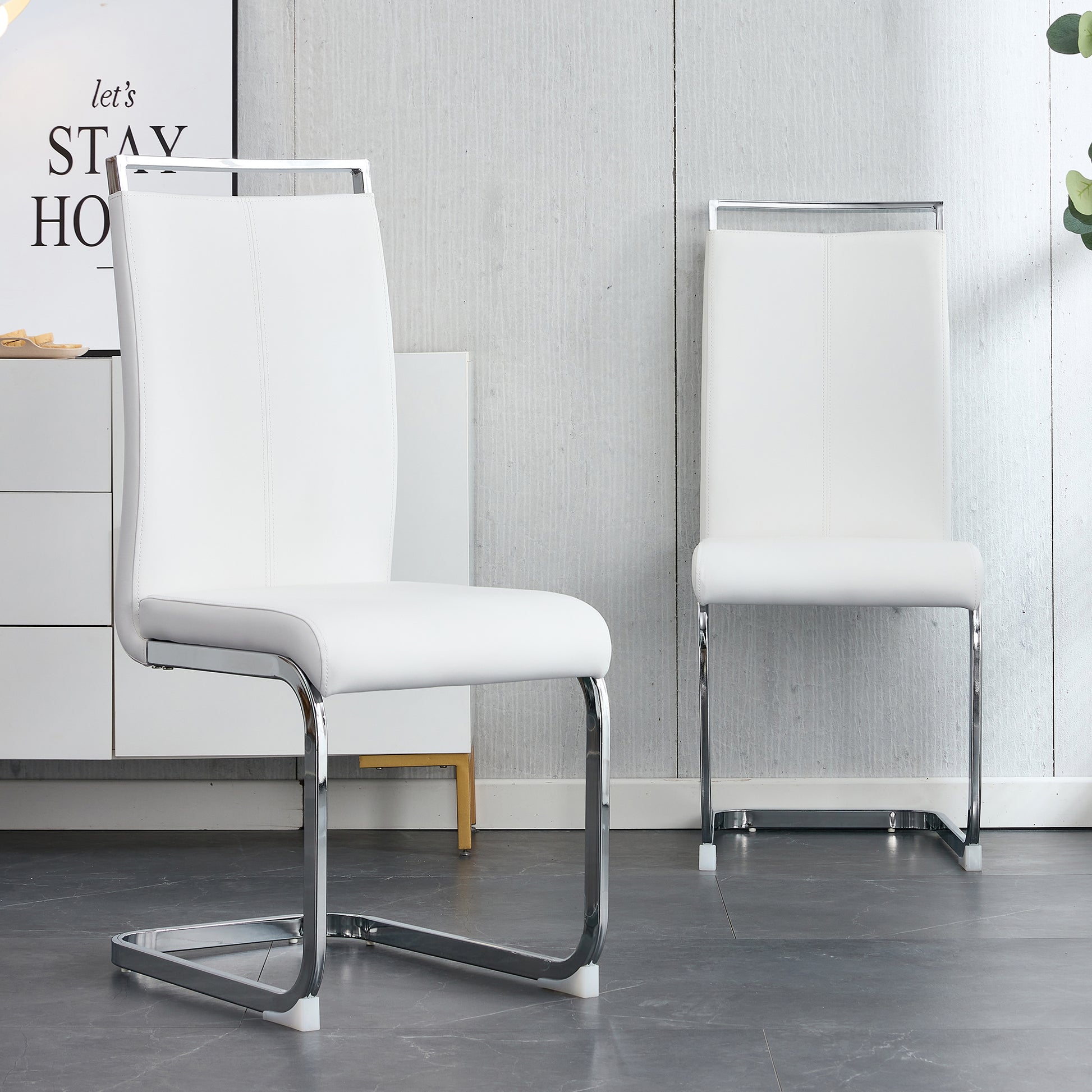 White faux leather dining chair with polished chrome cantilever base
