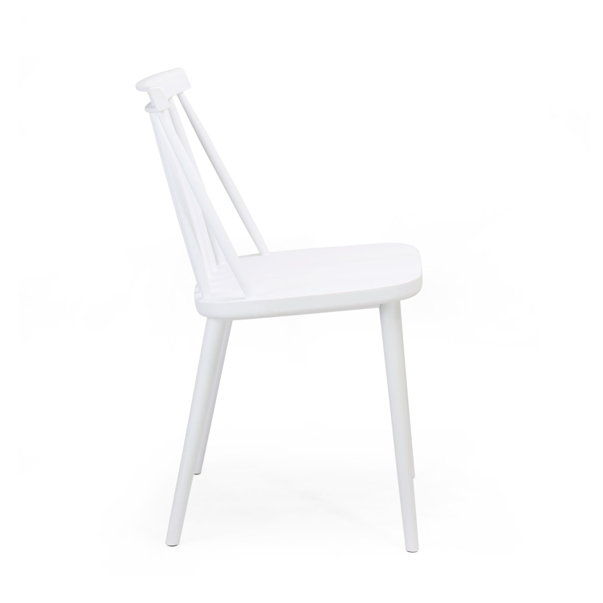 White wooden dining chair with spindle back and tapered legs
