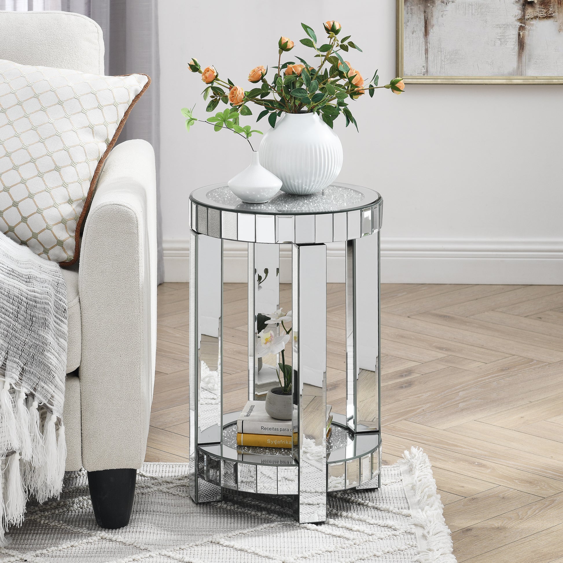 Glamorous mirrored accent table with faceted design and crystal inlay