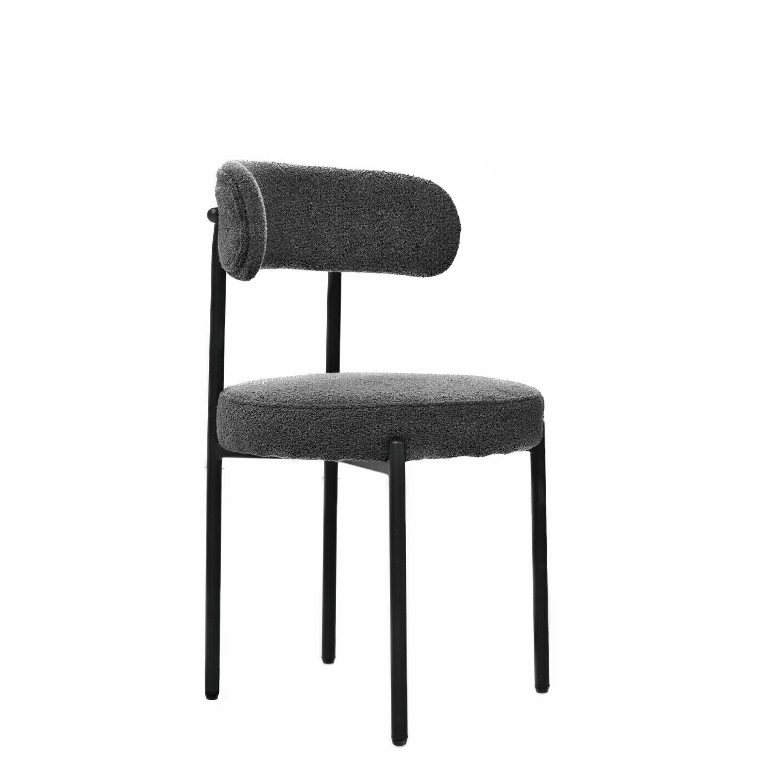 Dark grey boucle fabric accent chair with black metal legs and a curved backrest