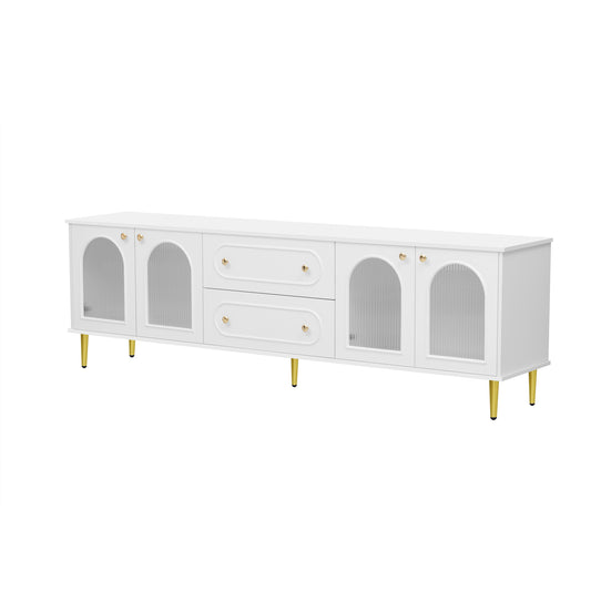 White modern media console with fluted glass cabinet doors and gold hardware