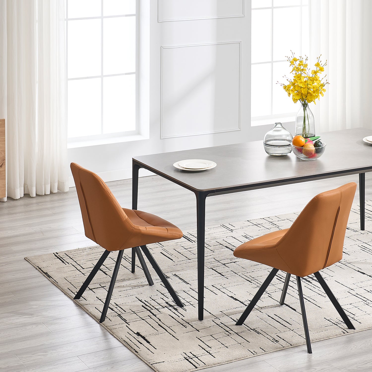 Tan faux leather dining chair with black metal legs
