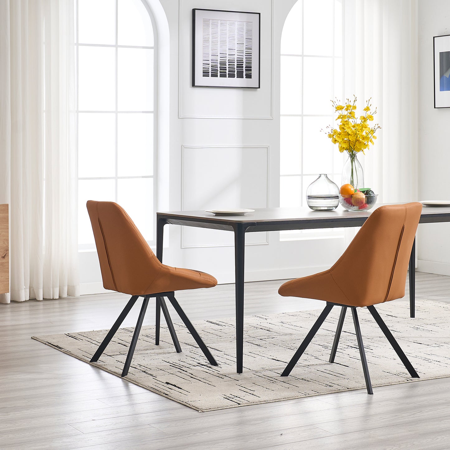 Brown faux leather dining chairs with black metal legs on a patterned rug