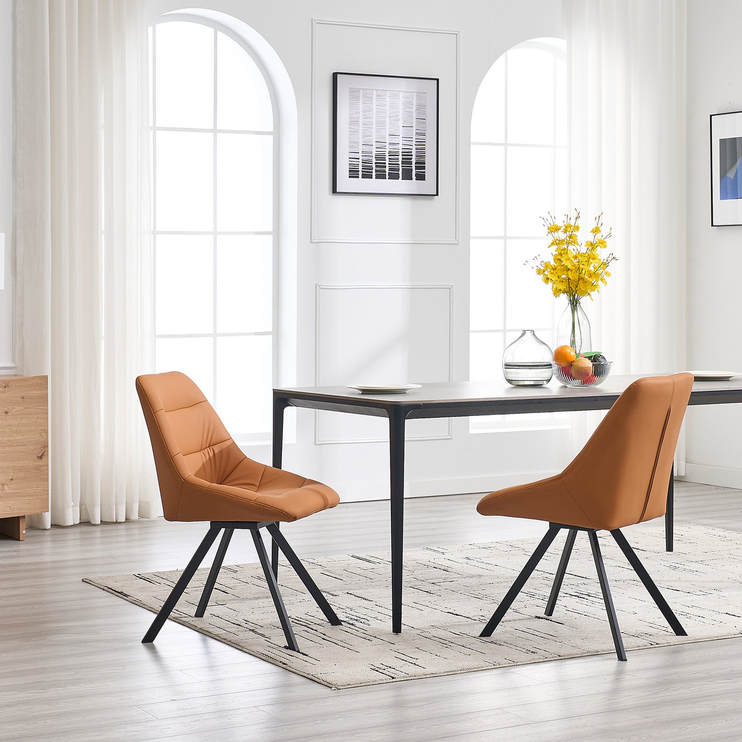 Tan upholstered dining chair with swivel base