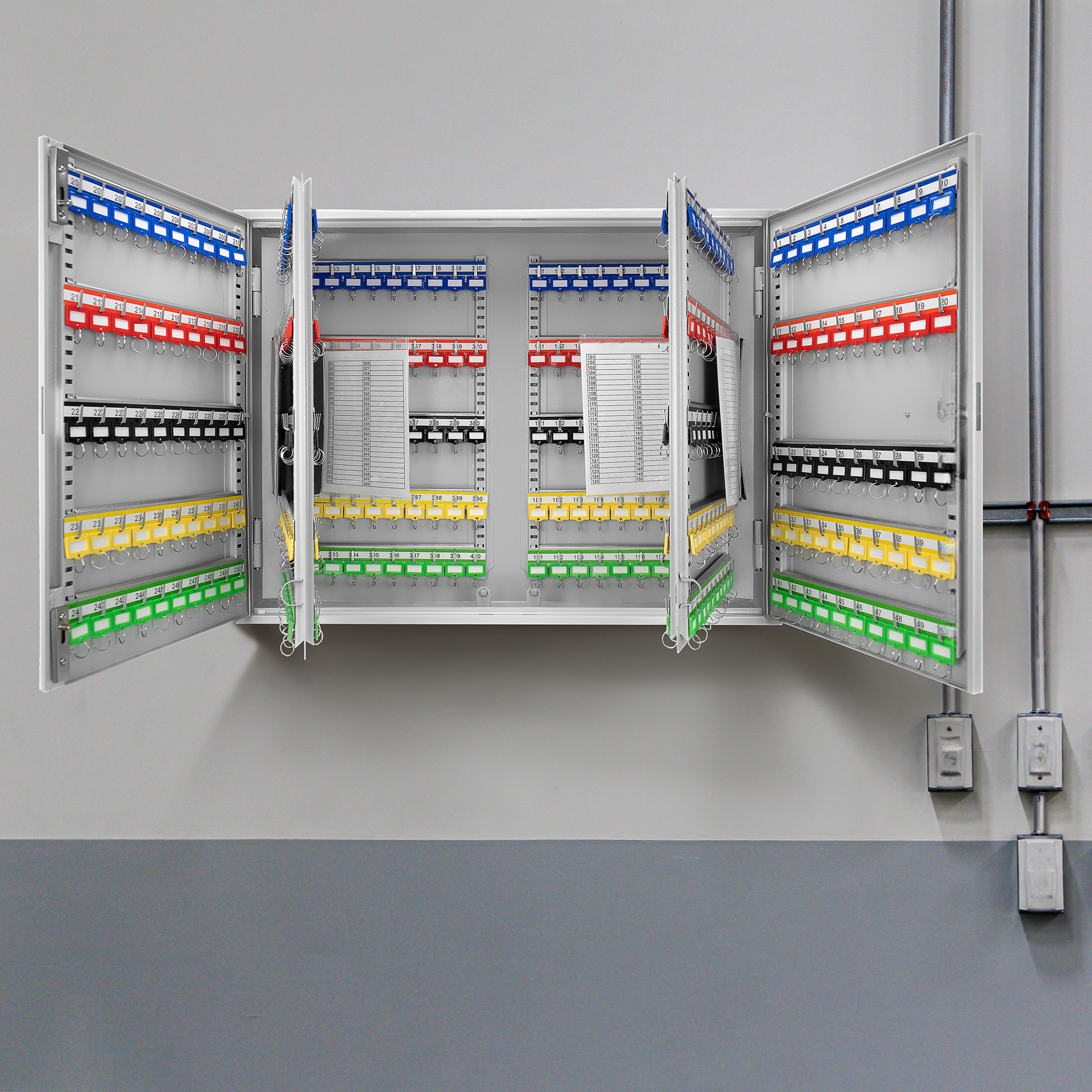 Metal key cabinet with colorcoded hooks for organized key storage