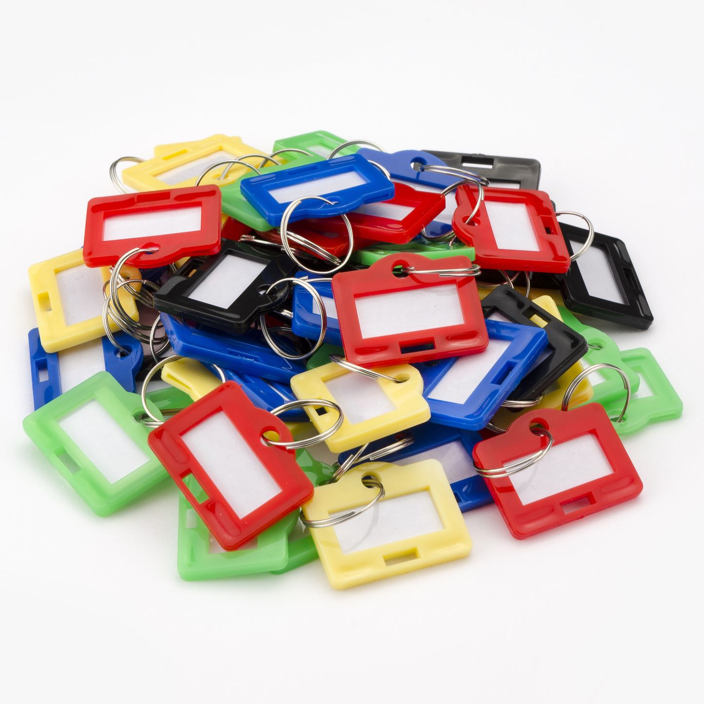 Assorted colorful plastic key tags with blank white inserts and metal key rings