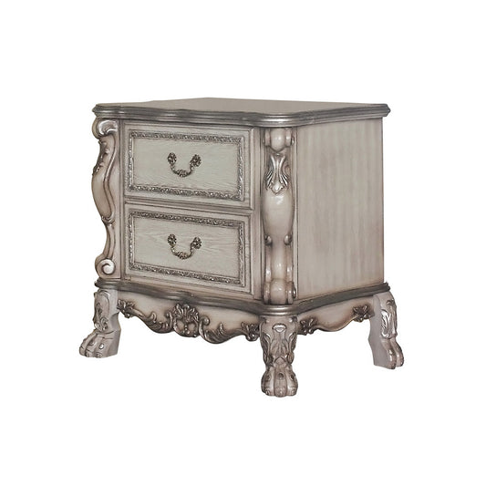 Antique white nightstand with two ornate drawers and silver trim