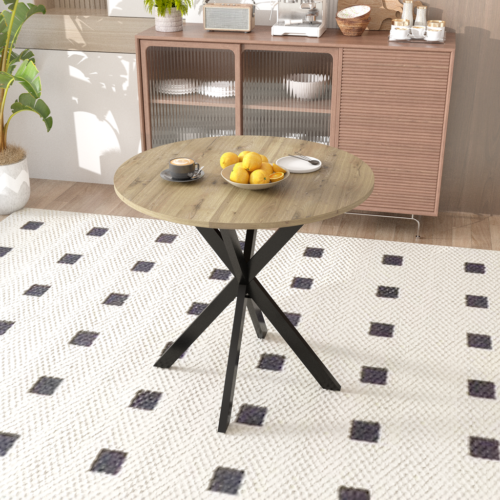 Round wood dining table with black metal base