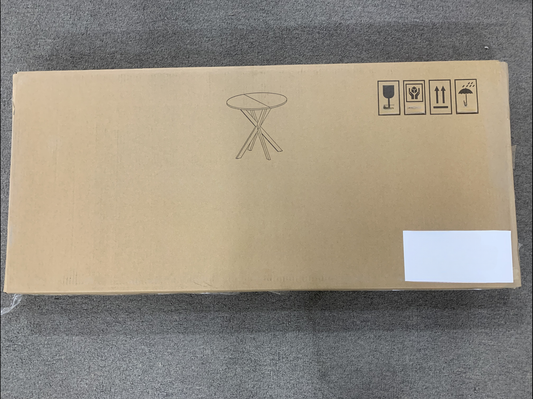 Cardboard box for folding picnic table with graphic of table and shipping symbols